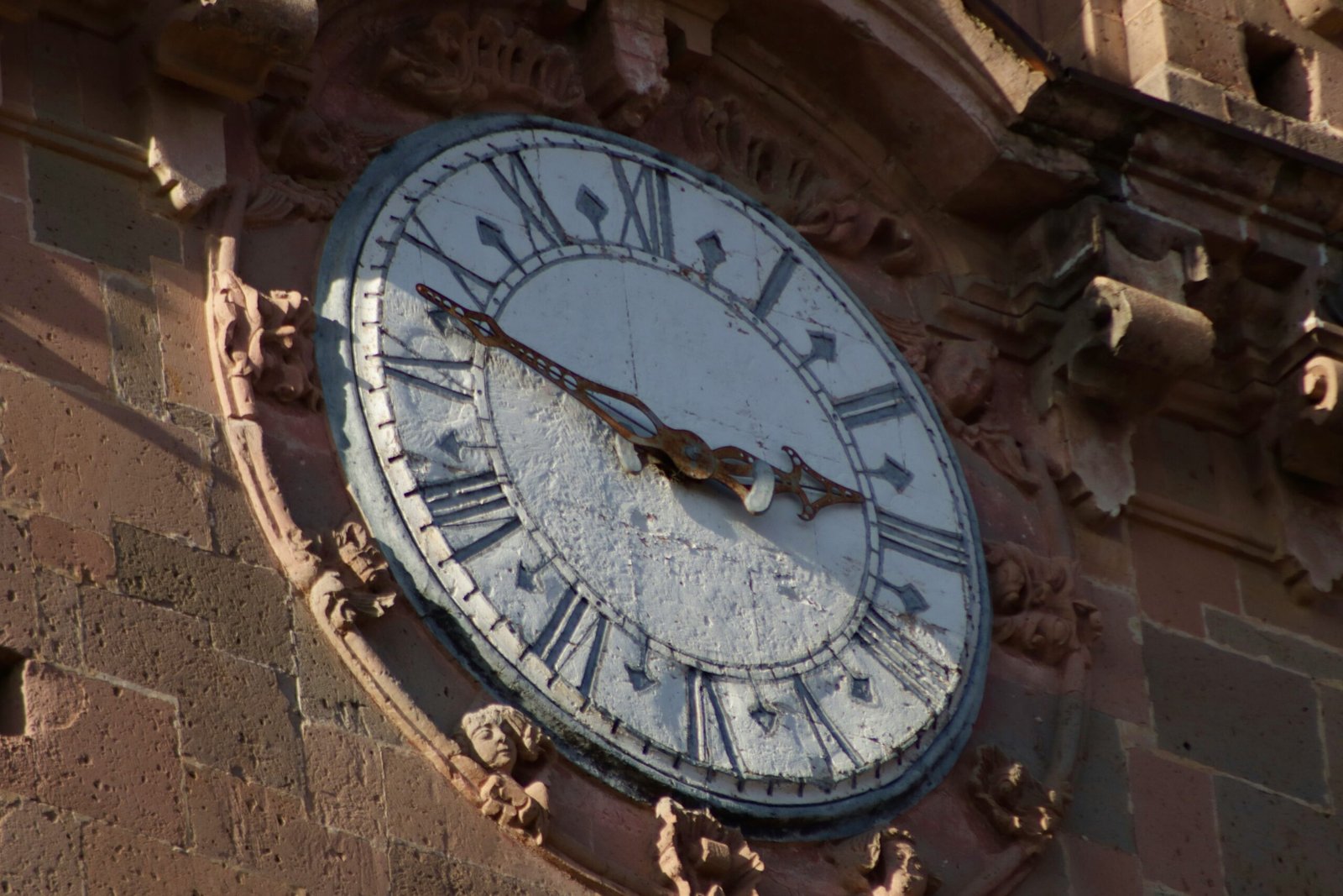 a large clock on the side of a building